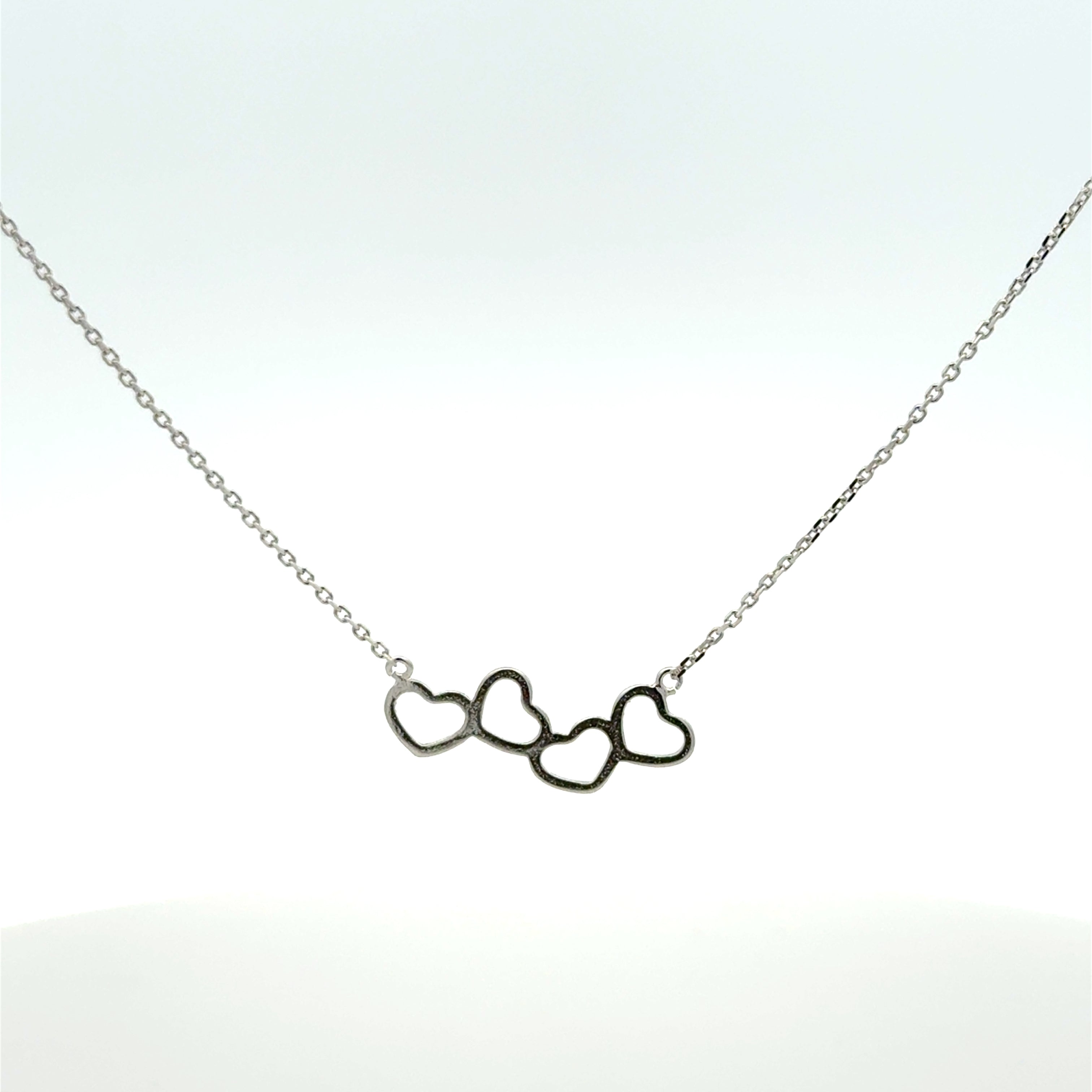 Delicate Silver Chain Necklace with Trio of Heart Pendants