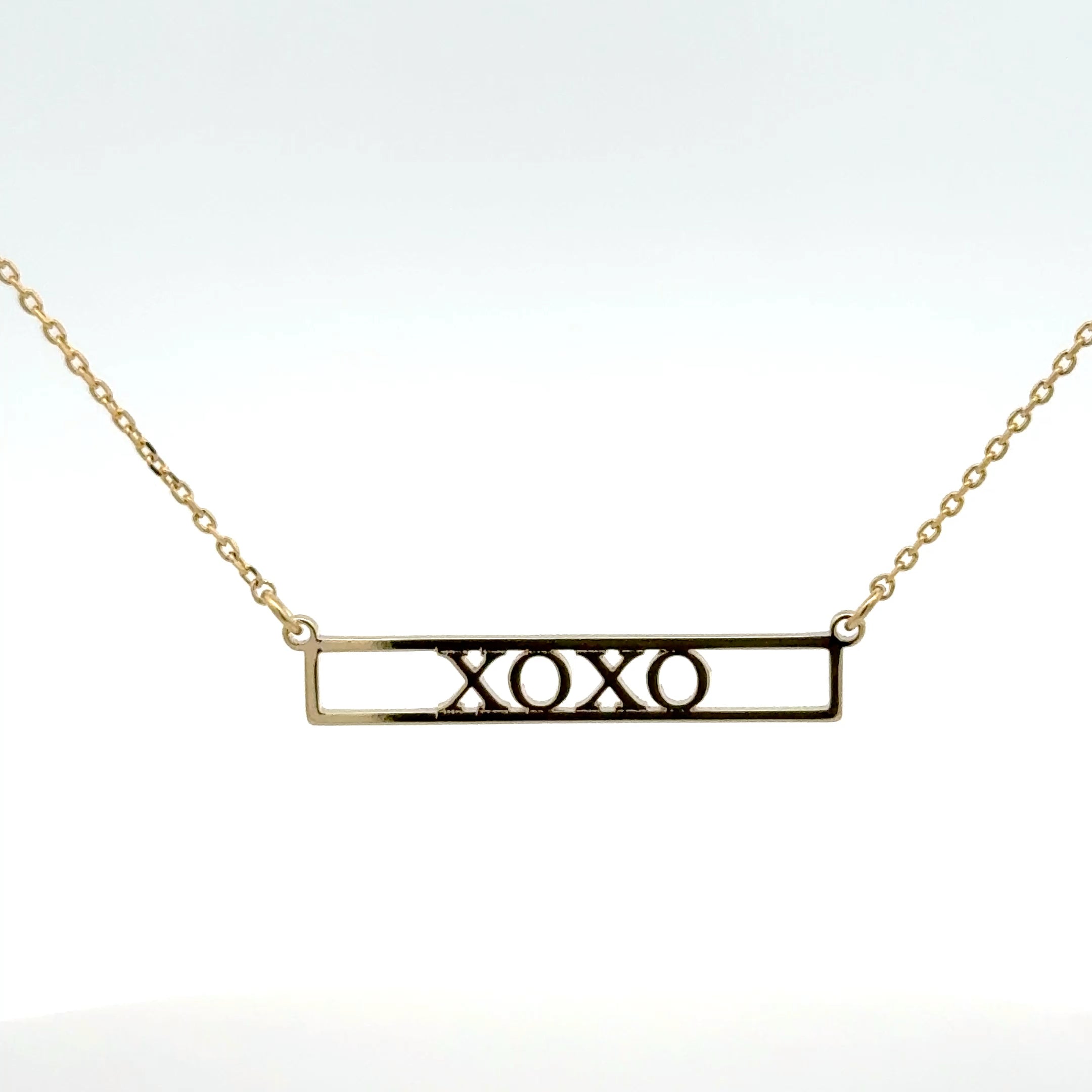 Elegant Gold 'XOXO' Charm Necklace