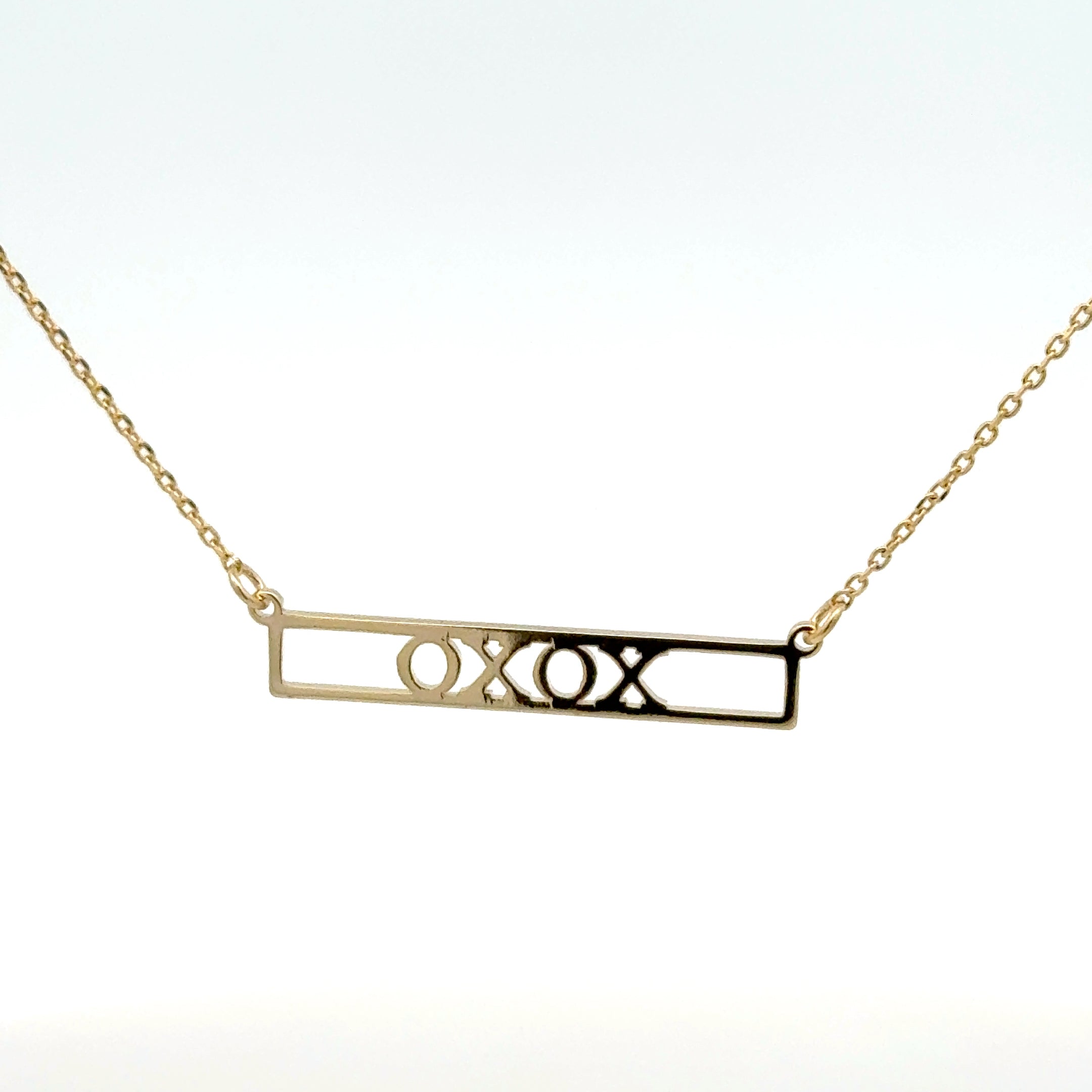 Elegant Gold 'XOXO' Charm Necklace