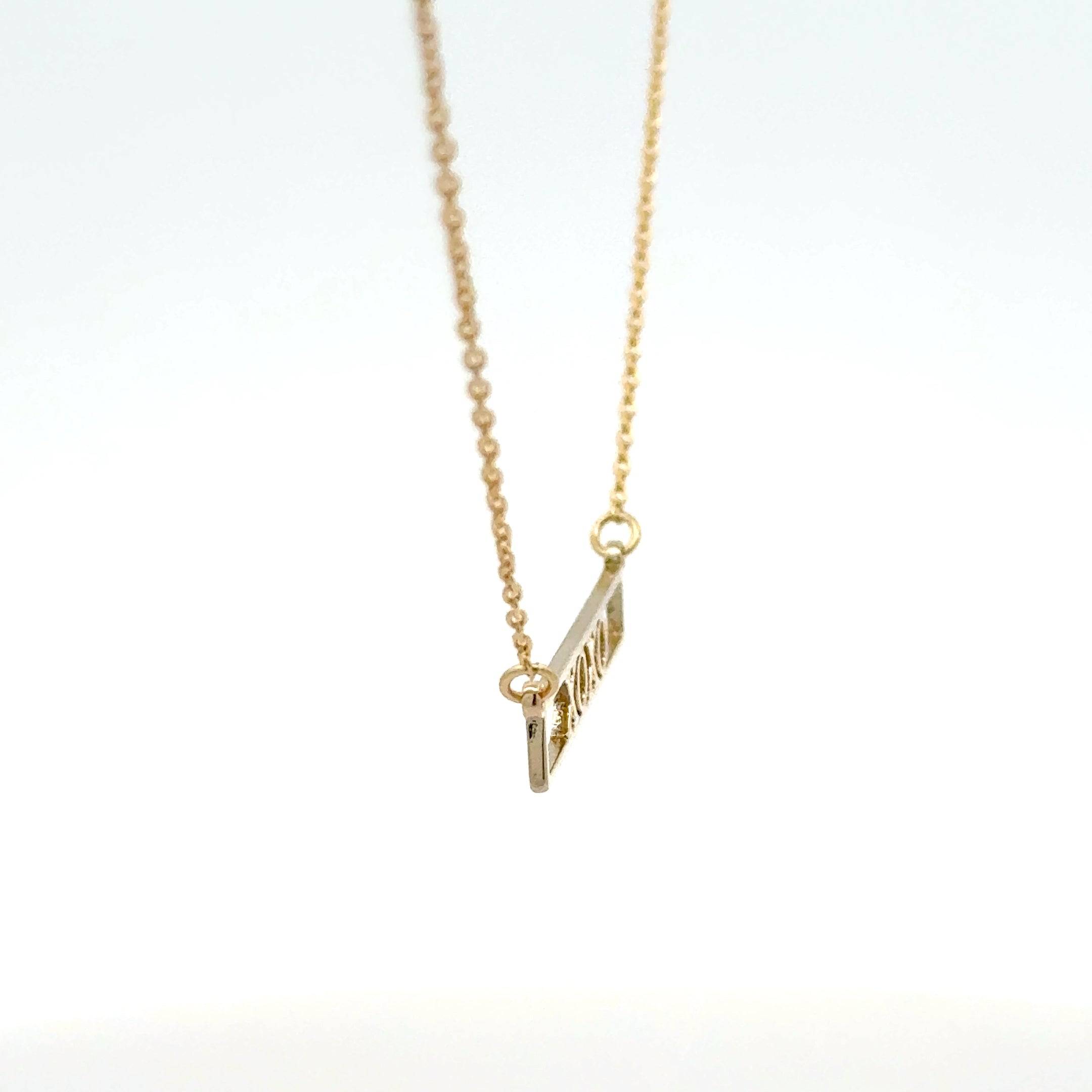 Elegant Gold 'XOXO' Charm Necklace