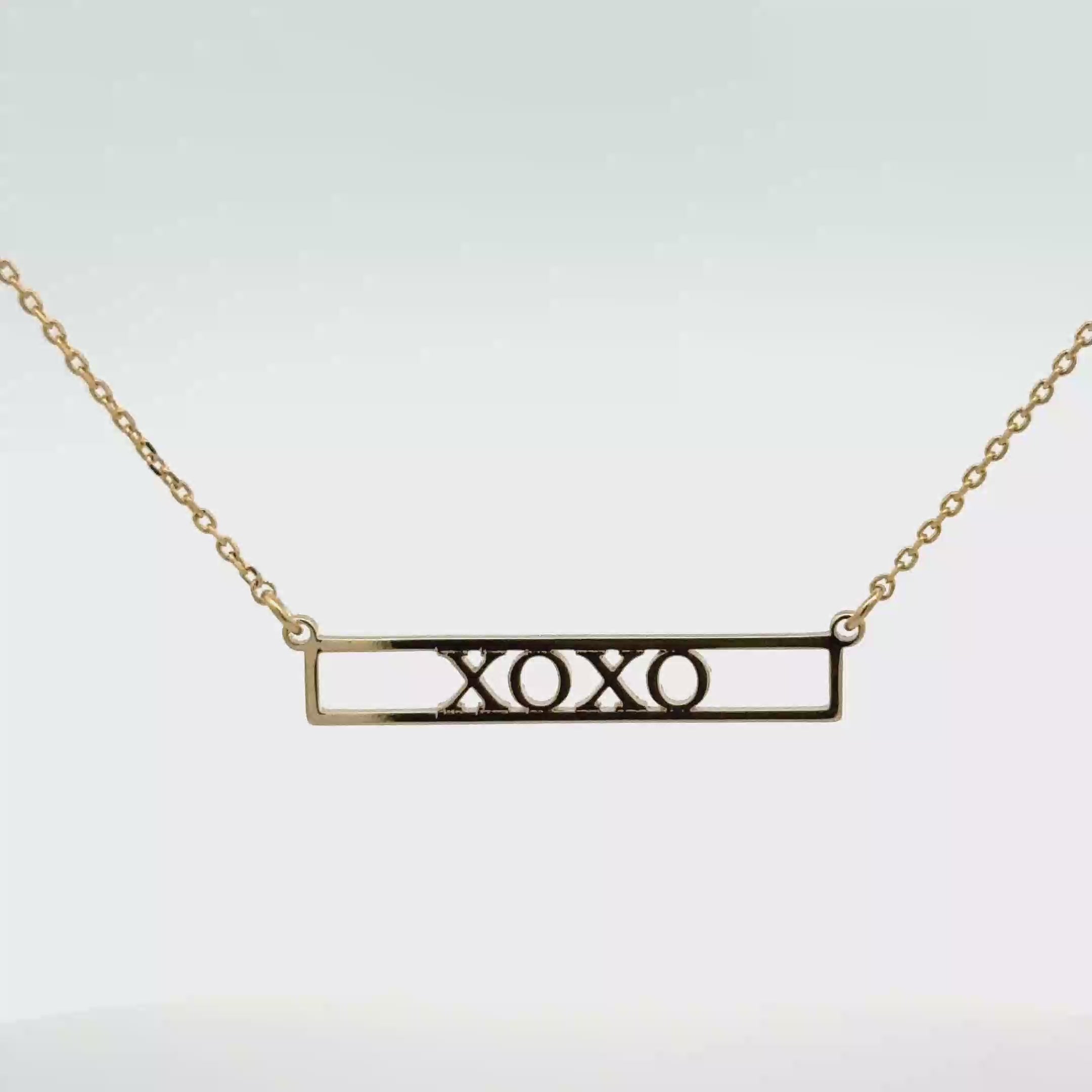 Elegant Gold 'XOXO' Charm Necklace