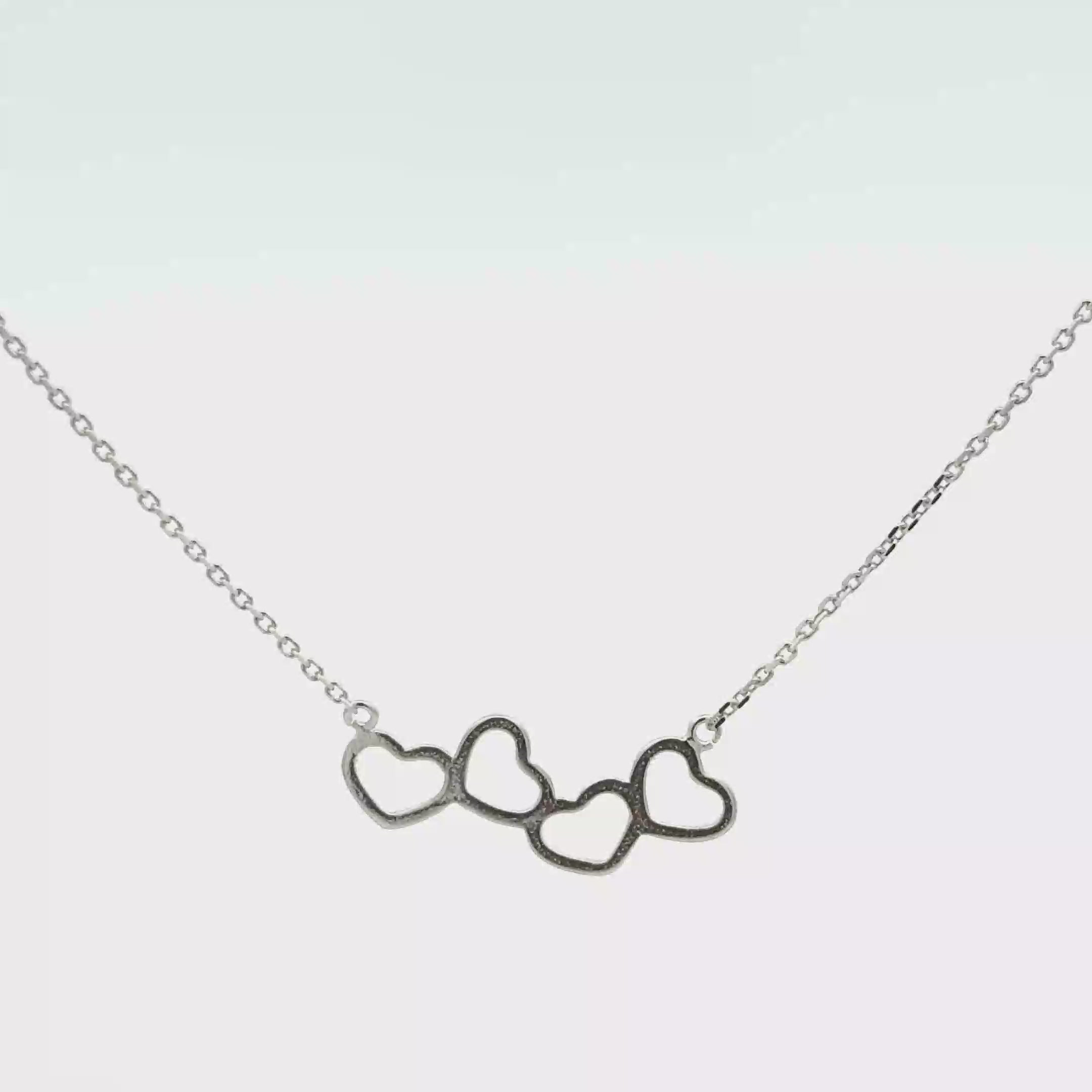 Delicate Silver Chain Necklace with Trio of Heart Pendants